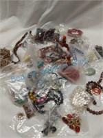 Large lot of jewelry items and beads