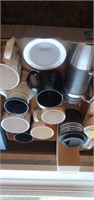 Travel mugs and coffee cups