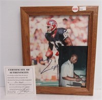 Framed 8 x 10 autographed Eric Moulds officially