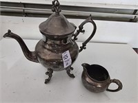 Silver plate  teapot and creamer. Teapot. 11.5in.