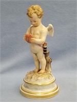 Porcelain cupid doll              (g 223)
