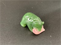 Alaskan Kobuk jade carved bear who has caught a la