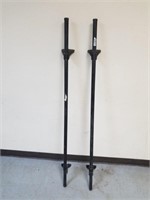 Two yakima roof rack bars with key