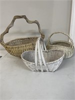3 baskets, one with wooden handle