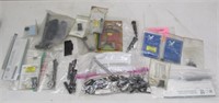 Good assortment of gun and sight parts, many for
