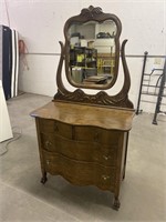 Serpentine dresser with mirror