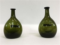(2) Early blown chestnut glass bottles,