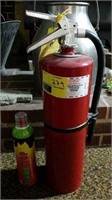 Fire Extinguisher and Can of Flame Stop