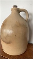 Antique pottery jug, some stamping visible, nicks