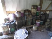 Misc. oil/grease cans/barrels (some may have conte