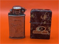 Mossy Oak & Camel lighters both used