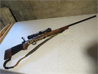 Remington 7MM rifle w scope w some ammo