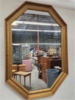 Vintage octagonal gilt-framed union-made mirror