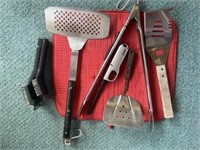 Grill utensils, spatulas, grill brushes, lighter,