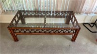 Glass top coffee table - 51 x 24 x 16