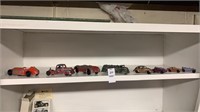 Shelf of Tootsietoy cars