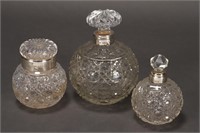 Three English Sterling Silver and Crystal Bottles,