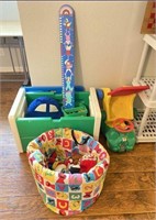 Assortment of Toys includes Little Tike Toy Box,