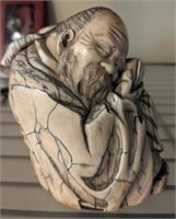 BONE CARVED MONK FIGURINE