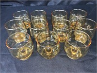 (11)  2 3/4" AMBER JUICE GLASSES