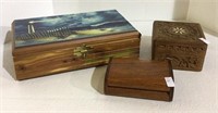 Wooden trinket boxes include a lighthouse