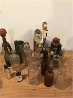 Box of assorted bottles -one says Welch's Jr