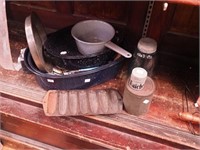 Nine vintage kitchen items including cast iron