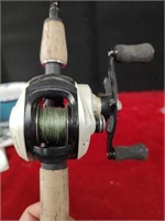 Okuma Stratus Fishing Reel w/ Rod with broken tip
