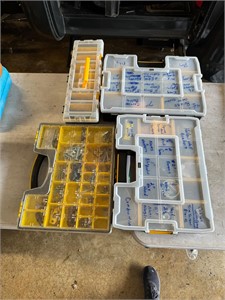 Assorted containers with nails screws bolts