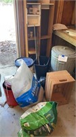 Contents of Corner Trash Can Metal Rods Fertilizer