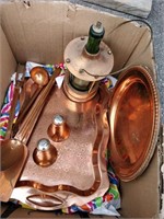 lot of copper dishes and lantern