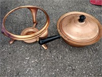 lot of copper dishes