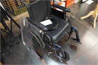 Invacare wheelchair with footrests & plastic tray