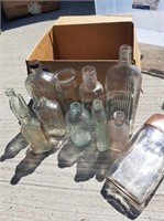 box of larger vintage bottles