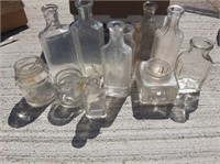 box of vintage small bottles