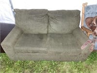 Loveseat with hide a bed