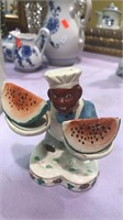 Black chef salt-and-pepper shakers bringing two