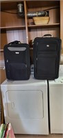 2 suitcases largest 26"L 16"w 9"h