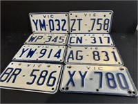 Eight Vintage Motorcycle Plates from Australia