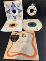 Five Vintage 45 rpm records