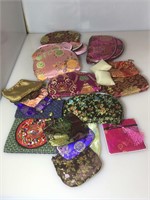 Assorted jewelry bags and cosmetics pouches. New.