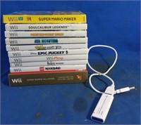 Assorted Wii games with a Wii U game and Nintendo