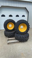 Set of 12-16.5N.H.S Skid Steer Tires and Rims