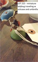 miniature ladybug traveling w suitcase / umbrella