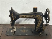 Antique Damascus Sewing Machine in Treadle Cabinet