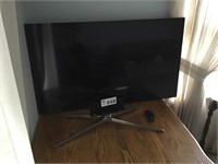 SAMSUNG FLAT SCREEN TV WITH STAND
