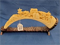 Chinese artificial tusk art on stand