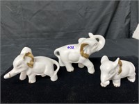 White and gold elephant figures