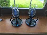 Two decorative candle stick holders