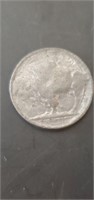 Buffalo nickel type coin. No date, no markings,